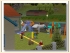 Kindergarten mit Spielplatz und Zaunelementen (1)